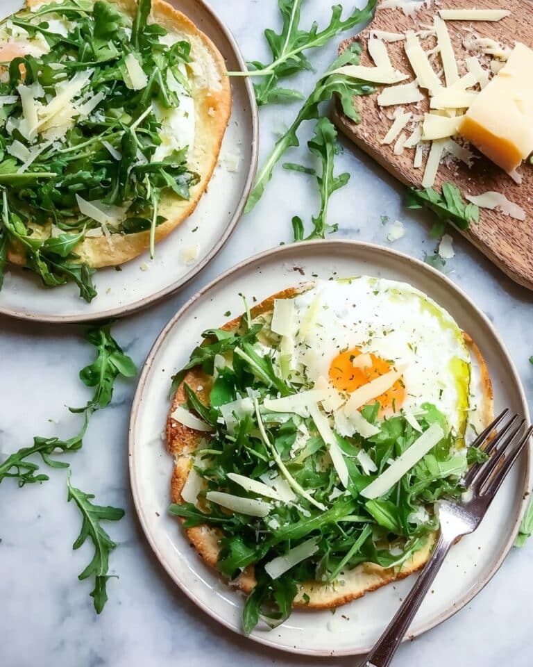 Mini Breakfast Pizzas with Ricotta, Egg, and Arugula Recipe