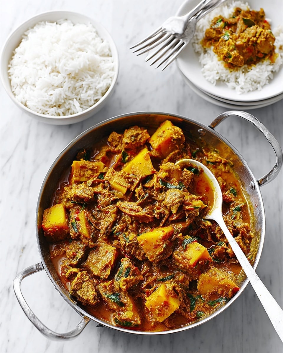 A metal pan filled with a stew made of chunks of orange sweet potatoes and pieces of chicken cooked in a rich, dark yellow-brown sauce with herbs. A white wooden spoon with some sauce on it rests inside the pan on the right side. Behind the pan, there are three stacked white bowls, with the top bowl holding a portion of the same stew. To the right of the stacked bowls, a separate white bowl is filled with plain white rice. Four silver forks are placed in front of the stacked bowls on a white marbled surface. The whole scene is bright and clear, on a white marbled background. photo taken with an iphone --ar 4:5 --v 7